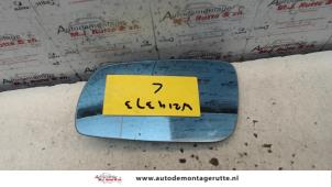O86006 Gebruikte spiegelglas links Volkswagen Golf