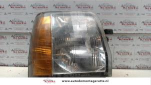 O74559 Gebruikte koplamp rechts Suzuki Wagon R+
