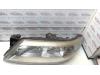 Gebruikte Linker Koplamp Renault Laguna O72812