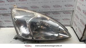 O74616 Gebruikte koplamp rechts Toyota Prius