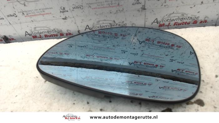 Spiegelglas links van een Citroën C4 Berline (LC) 1.6 HDi 16V 110 2005