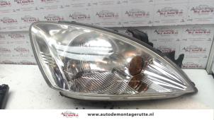 O74322 Gebruikte koplamp rechts Mitsubishi Lancer