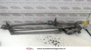 O118402 Gebruikte ruitenwismotor+mechaniek Ford Focus