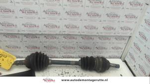O110999 Gebruikte cardanas links-voor (vwa) Opel Astra