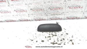 O79814 Gebruikte portiergreep 2deurs links Nissan Micra