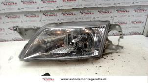 O72313 Gebruikte linker koplamp Mazda Premacy
