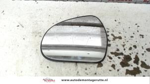 O86182 Gebruikte spiegelglas links Peugeot 207