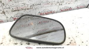 O86321 Gebruikte spiegelglas links Suzuki Ignis