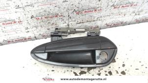 O80141 Gebruikte portiergreep 4deurs links-voor Fiat Punto Evo