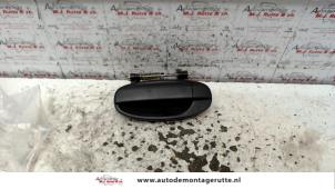 O89425 Gebruikte deurgreep 4deurs links-achter Daewoo Kalos