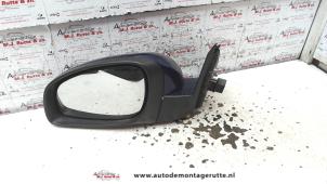 O84470 Gebruikte spiegel buiten links Opel Vectra