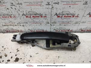 O134488 Gebruikte portiergreep 4deurs links-voor Seat Leon