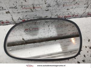 O135073 Gebruikte spiegelglas links Daewoo Lanos
