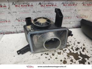 O135086 Gebruikte mistlamp links-voor Opel Corsa