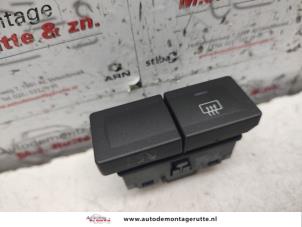 O135184 Gebruikte verwarmingsschakelaar achterruit Ford Fiesta