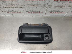 O135434 Gebruikte portiergreep 4deurs links-voor Suzuki Swift