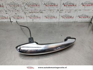 O135586 Gebruikte portiergreep 2deurs rechts BMW Mini One