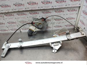 O135615 Gebruikte ruitmechaniek 2deurs links-voor Nissan Micra