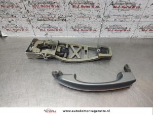 O135773 Gebruikte portiergreep 4deurs links-voor Volkswagen Touran