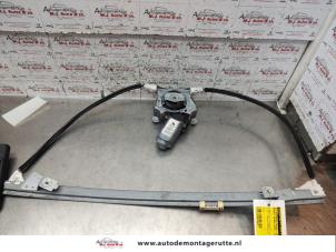 O136271 Gebruikte ruitmechaniek 4deurs links-voor Renault Megane Scenic