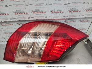 O136289 Gebruikte achterlicht links Renault Grand Scenic