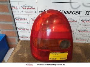O136388 Gebruikte achterlicht links Opel Corsa