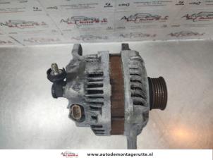 Alternator van een Subaru Legacy Wagon (BR) 2.0 16V 2009