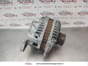 Alternator van een Subaru Legacy Wagon (BR) 2.0 16V 2009