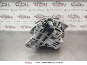 Alternator van een Subaru Legacy Wagon (BR) 2.0 16V 2009