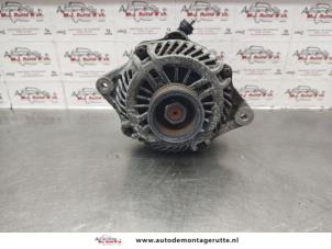 Alternator van een Subaru Legacy Wagon (BR) 2.0 16V 2009