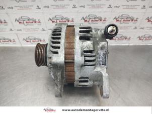 Alternator van een Subaru Legacy Wagon (BR) 2.0 16V 2009