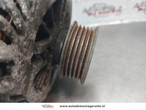 Alternator van een Subaru Legacy Wagon (BR) 2.0 16V 2009