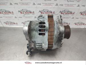 Alternator van een Subaru Legacy Wagon (BR) 2.0 16V 2009