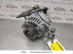 O137213 Gebruikte alternator Toyota IQ