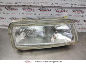 O137255 Gebruikte koplamp links Volkswagen Passat