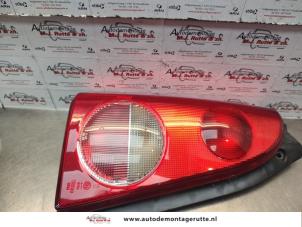 O137497 Gebruikte achterlicht links Opel Agila