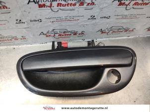 O137511 Gebruikte deurgreep 4deurs links-voor Subaru Legacy