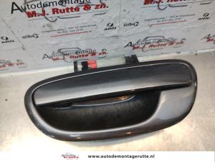 O137512 Gebruikte deurgreep 4deurs links-achter Subaru Legacy