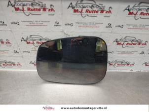 O137634 Gebruikte spiegelglas links Suzuki Swift