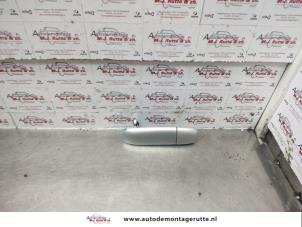 O138612 Gebruikte deurgreep 4deurs rechts-voor Mitsubishi Colt