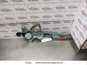 O138676 Gebruikte raammechaniek 2deurs rechts-voor Toyota Yaris