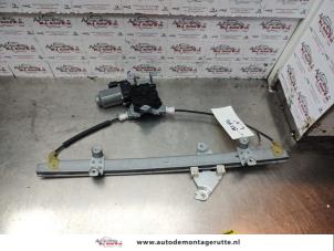 O138852 Gebruikte ruitmechaniek 4deurs links-voor Nissan Note