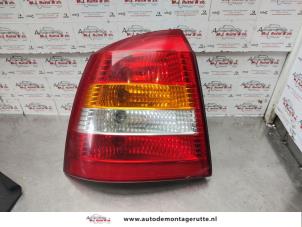 O139099 Gebruikte achterlicht links Opel Astra