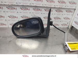 O139838 Gebruikte spiegel buiten links Nissan Almera