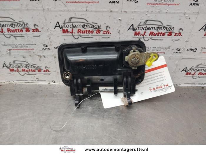 Portiergreep 4Deurs links-voor van een Suzuki Swift (SF413/416) 1.3i GL,GX 1993