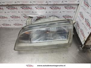 O140059 Gebruikte linker koplamp Suzuki Swift