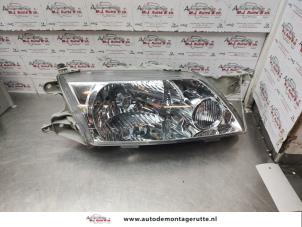 O140129 Gebruikte koplamp rechts Mazda Premacy