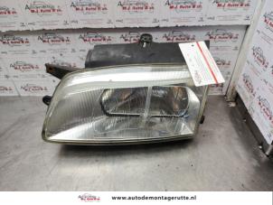 O140359 Gebruikte linker koplamp Citroen Berlingo