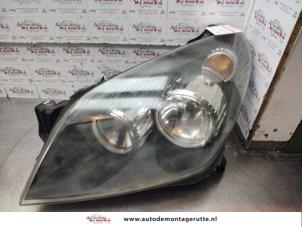 O140486 Gebruikte linker koplamp Opel Astra