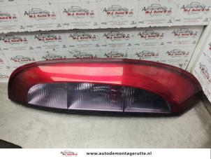 O140885 Gebruikte achterlicht links Opel Corsa